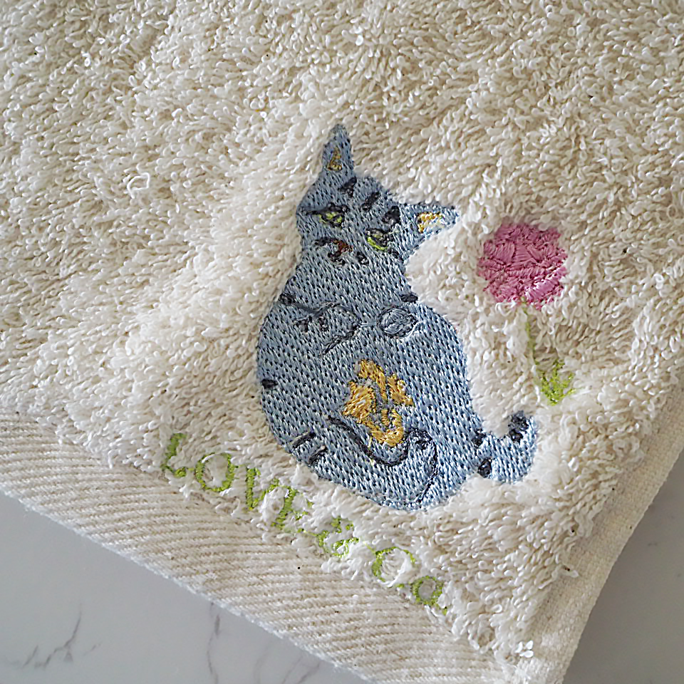 スカビーママンの刺繍のオーガニックコットンミニタオル