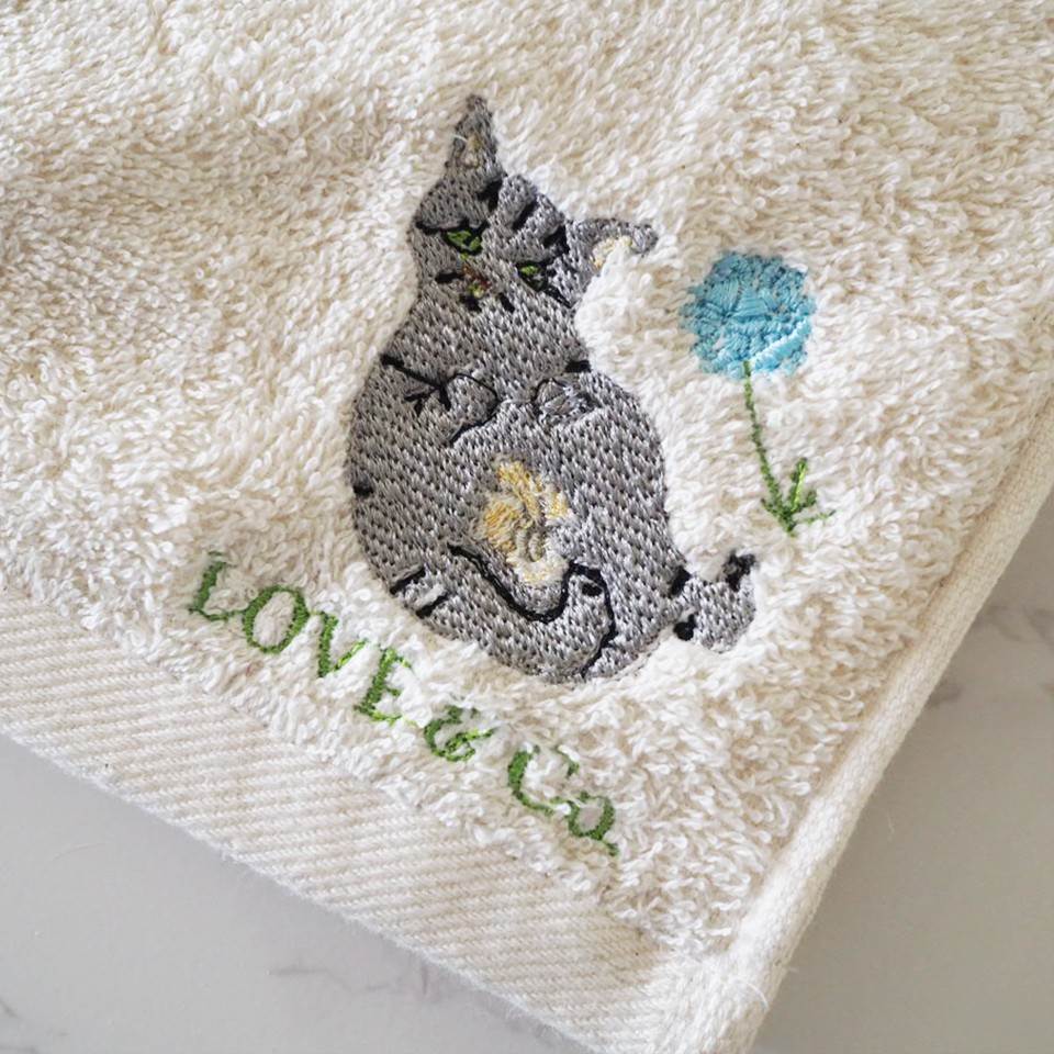 スカビーママンの刺繍のオーガニックコットンミニタオル