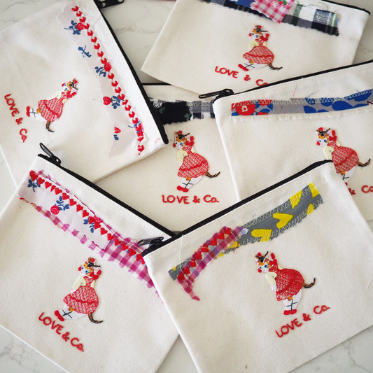 ピノ子の刺繍のフラットポーチ【ぼったくりチェキつき】