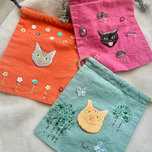 手染めのビーズ刺繍巾着 by yui