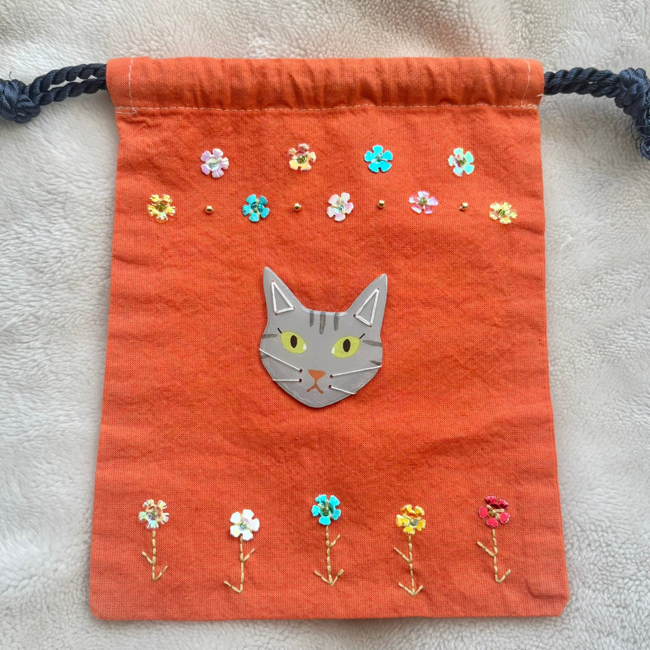 手染めのビーズ刺繍巾着 by yui