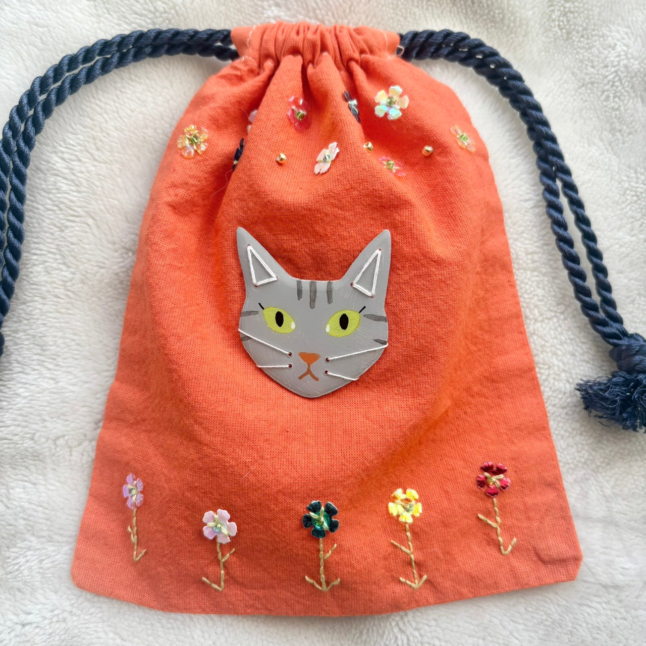 手染めのビーズ刺繍巾着 by yui