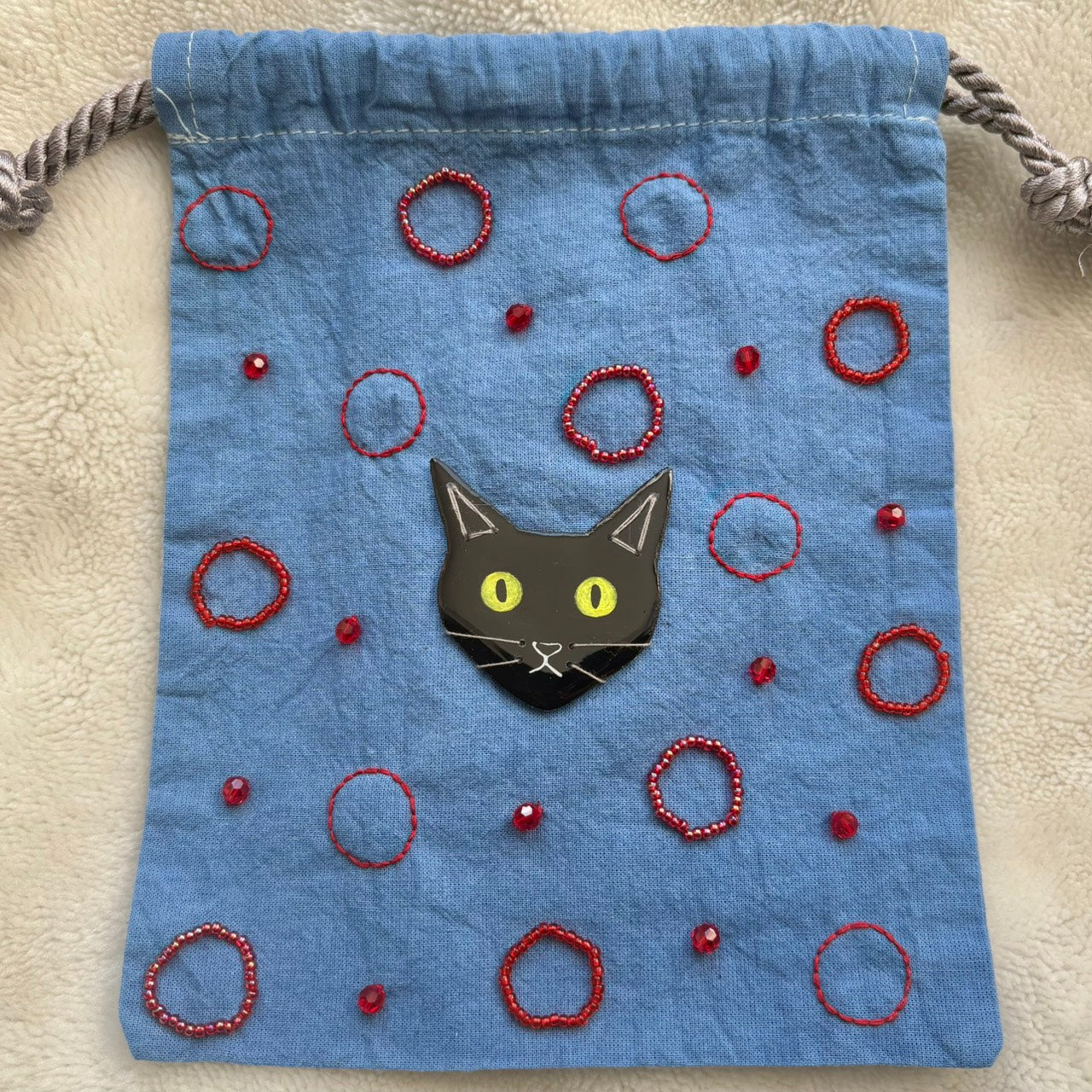 手染めのビーズ刺繍巾着 by yui