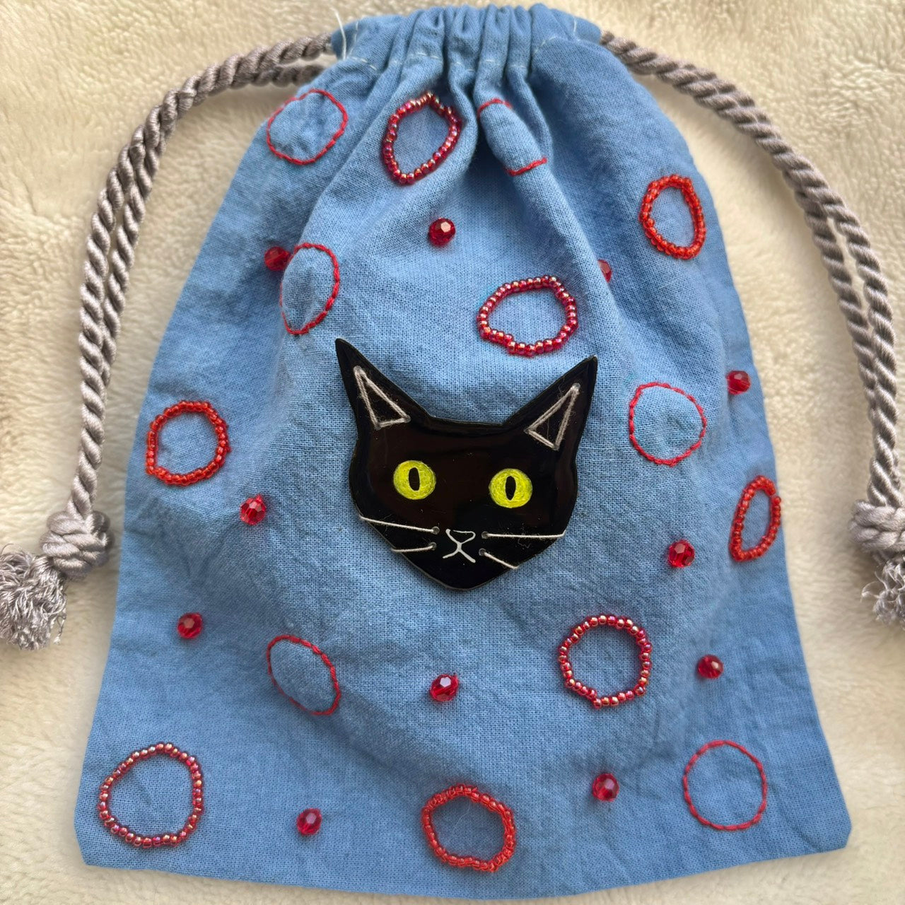 手染めのビーズ刺繍巾着 by yui