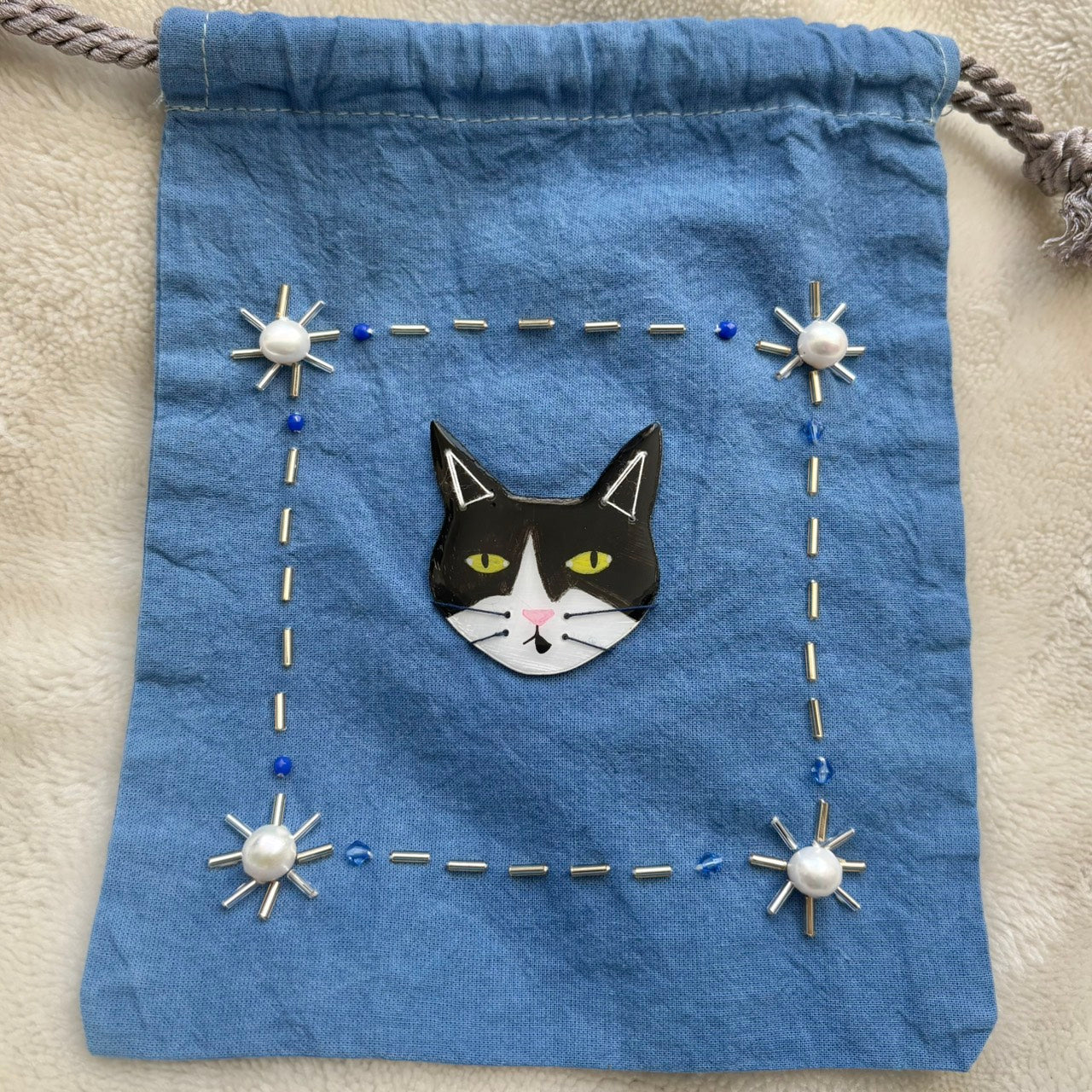 手染めのビーズ刺繍巾着 by yui