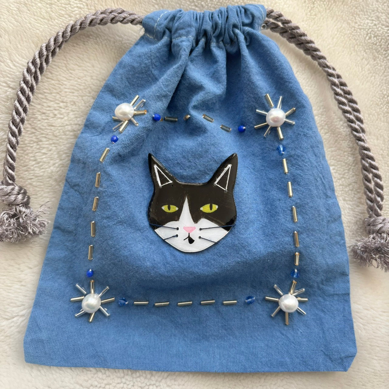 手染めのビーズ刺繍巾着 by yui